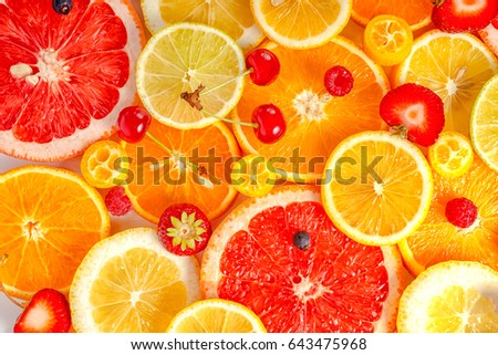 fresh trendy seamless pattern sliced mixed citrus fruits like background with different berries, concept of healthy eating, dieting, top down