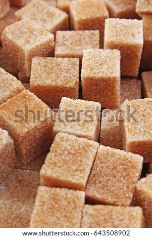 Granulated brown sugar. Lump sugar. Brown sugar cubes. Cane sugar. 