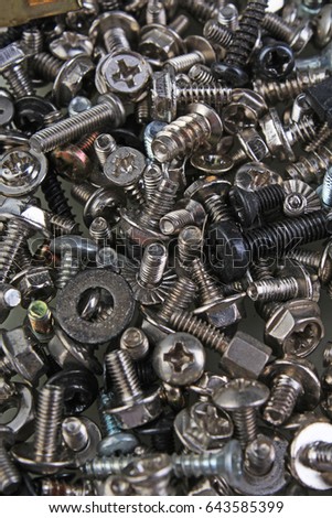 Nuts and bolts.
Screw,tweak,bolts,twist,maternal background as texture.