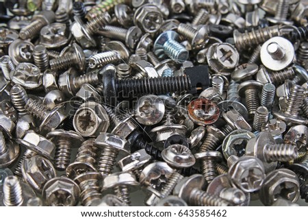 Nuts and bolts.
Screw,tweak,bolts,twist,maternal background as texture.