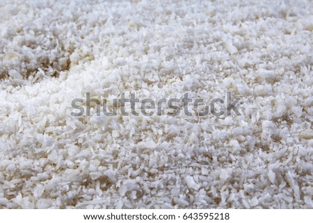 Desiccated coconut texture pattern as background.