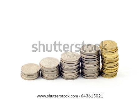 IMAGE OF SILVER AND GOLD COINS FORMING STAIR SHAPE