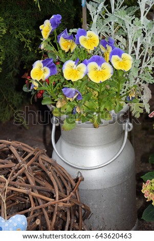 Milk pot with flowers