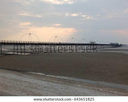 southport beach and pier at sunset
