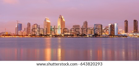 Panorama view of San Diego Skyline After Sunset. Photo Showing Downtown viewing from Centennial Park.  San Diego is on the coast of the Pacific Ocean in Southern California, USA.
