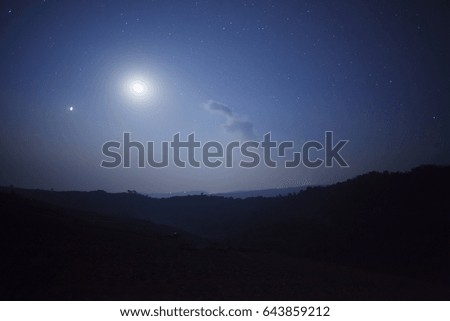 Night nature background, cloudy sky with stars and moon light
