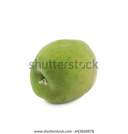 Single green olive isolated over the white background