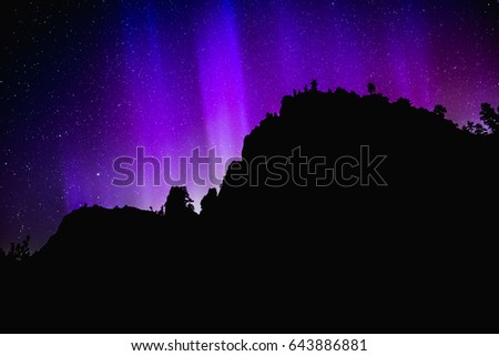 Streaks of northern lights or aurora borealis.