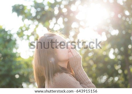 Portrait of asian woman with the beautiful bokeh background.