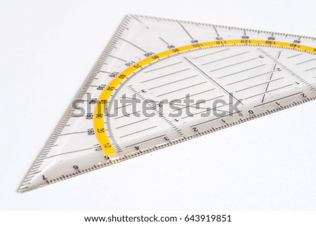 Triangle ruler on white background