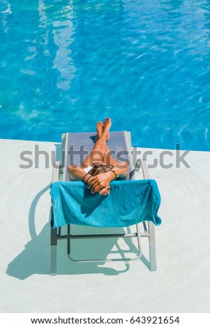 Woman at the swimming pool