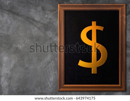 Financial success concept, gold dollar currency symbol and wooden frame