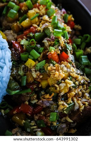 Purple rice and stir fried mix vegetables with salted pork. 