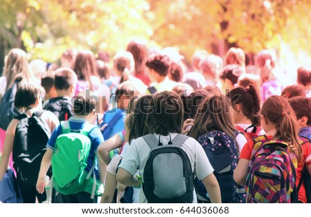 Kids in the nature strolling Royalty-Free Stock Photo #644036068