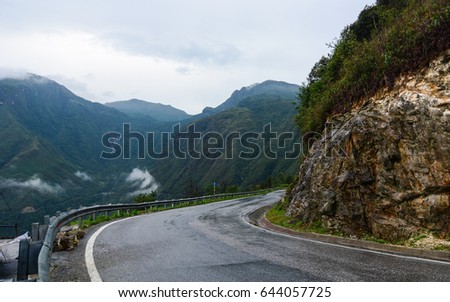 The road with mountains in Sapa, Vietnam. Sapa is a beautiful, mountainous town in northern Vietnam along the border with China.
