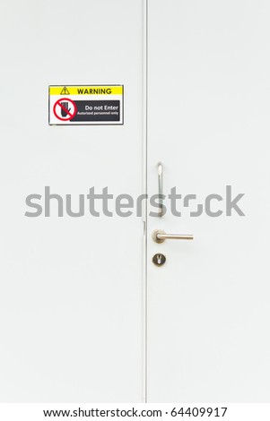 no entry warning sign on lock door