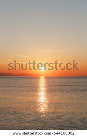 beautiful sunset sunrise at sea sun nature clouds rays