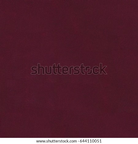 Dark red leather texture. Seamless square background, tile ready. High resolution photo.
