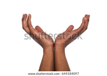 Charity, care concept. Black male hands keep empty cupped palms together isolated on studio white background