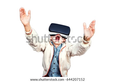 Little boy in virtual reality glasses isolated on white background