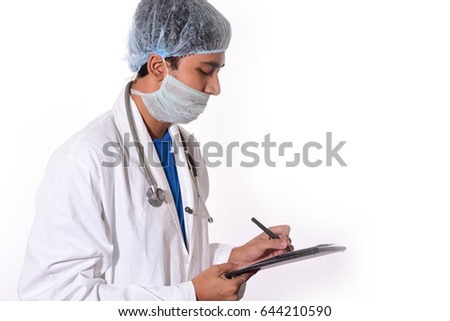 Doctor is writing prescription 
