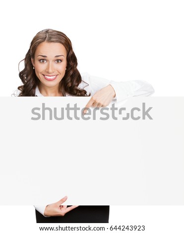 Happy young businesswoman showing signboard, with blank copyspace area for slogan, advertisiment or text message, isolated against white background. Success in business concept studio shot. 