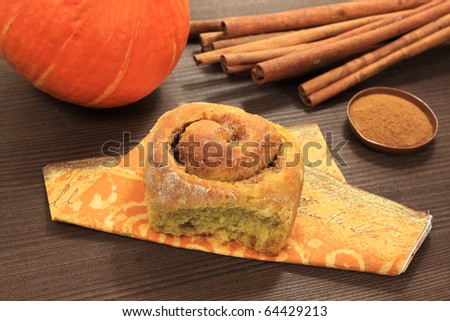 Pumpkin sweet roll with spices composition