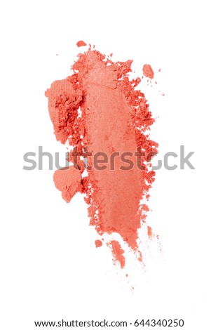 Smear of crushed orange eyeshadow as sample of cosmetic product isolated on white background