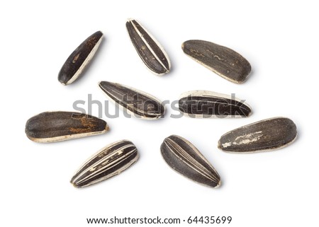 Close up of fresh sunflower seeds isolated on white background