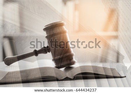 Double exposure of Judge gavel, law books and courthouse background. Concept of law, legal.