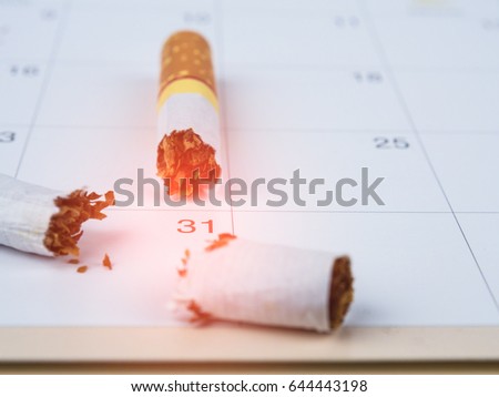 Broken cigarette, and calendar May. World No Tobacco Day concept.
