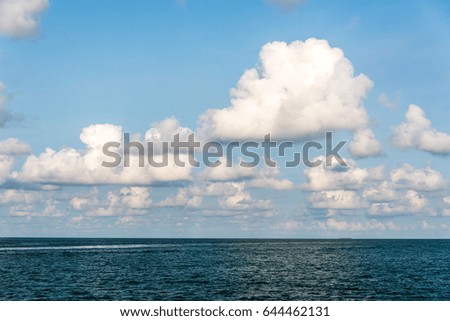 Sea with blue sky and cloud
