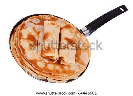 Pancakes pile and two pancakes with filling in the pan. Isolated on white background