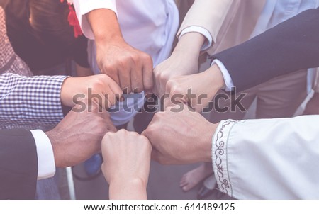 Many hand of business people join respect  teamwork Concept partnership touching hands promise for trust mind team. All of people promise to do honesty business. Business Team reach an agreement . Royalty-Free Stock Photo #644489425
