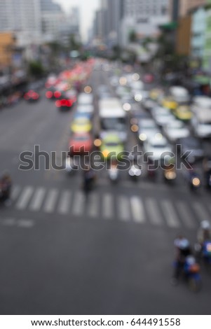 defocused scene of car in red light signal on traffic in Bangkok, Thailand