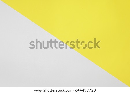 Two color paper with Yellow and white Overlap on the floor And split half of the image. background