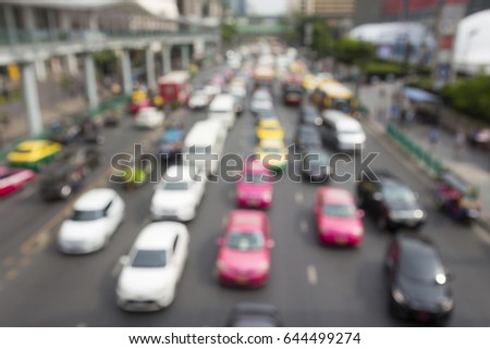 blurred background of traffic jam in ratchaprasong area, Bangkok, Thailand