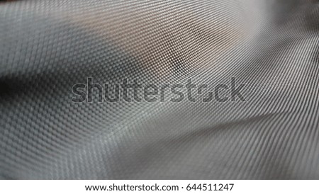 A texture of gray fabric. This picture is close up and selective focus.