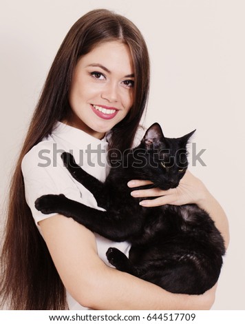 young beautiful woman with cat