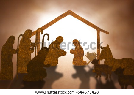 Christmas nativity scene including Jesus,Mary,Joseph,sheep and donkey ,Brown paper cut silhouette concept.