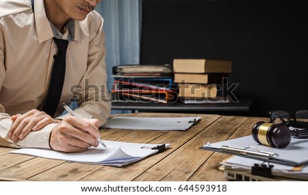 Lawyer working hard his job paperwork  at office, vintage picture style.