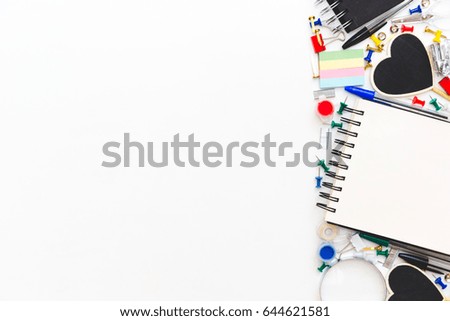 School and office stationery at white table. Flat lay with copy space.
