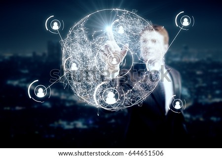 Businessman pointing/pressing abstract polygonal globe with connected people icons. Hiring concept