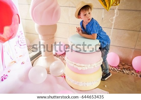 Cute 5 year old Caucasian boy at the birthday party photo set.