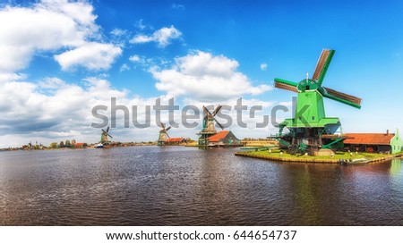 Authentic Zaandam mills on the water channel in Zaanstad, The Netherlands