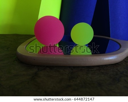 Colorful balls and reflection