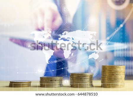 Stack coins on business man background with graphic icon. Financial concept.