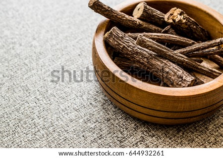 Dried Licorice Sticks in wooden bowl / Meyan Koku
 Royalty-Free Stock Photo #644932261