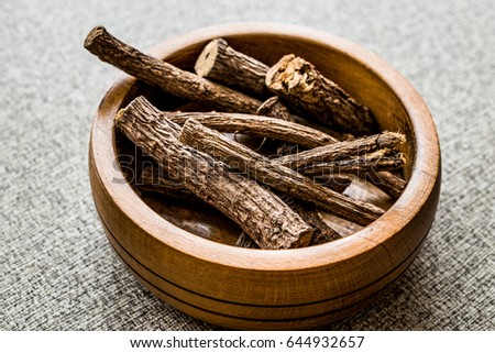 Dried Licorice Sticks in wooden bowl / Meyan Koku
 Royalty-Free Stock Photo #644932657