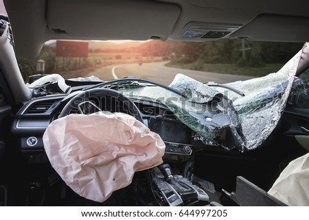 Car of accident make  airbag explosion damaged at claim the insurance company. Double exposure car accident and road with mountains. Image blur focus and Adjustment beautiful color sepia style.